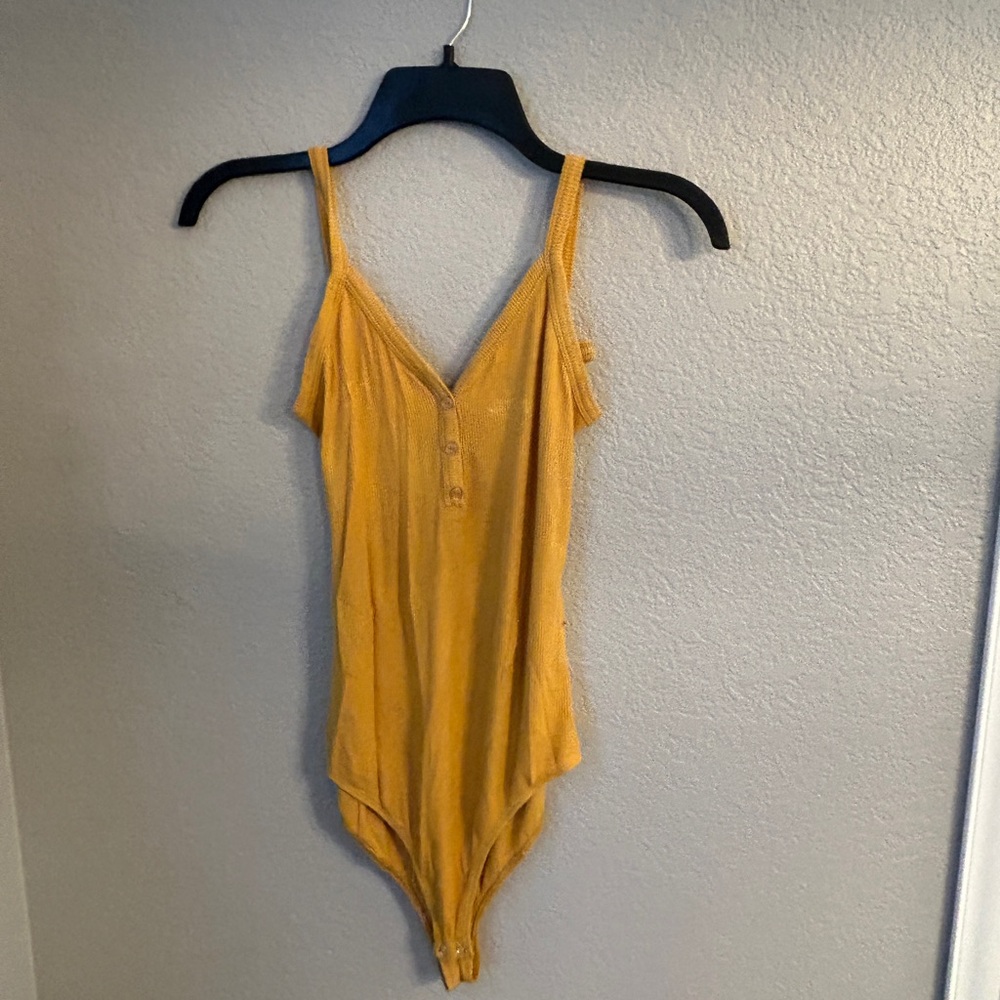 Yellow bodysuit